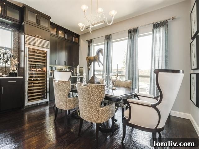Formal Dining Area with Modern Chandelier and Artwork