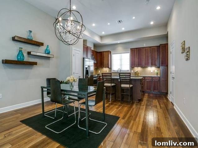 Open Concept Dining and Kitchen Area with Chandelier
