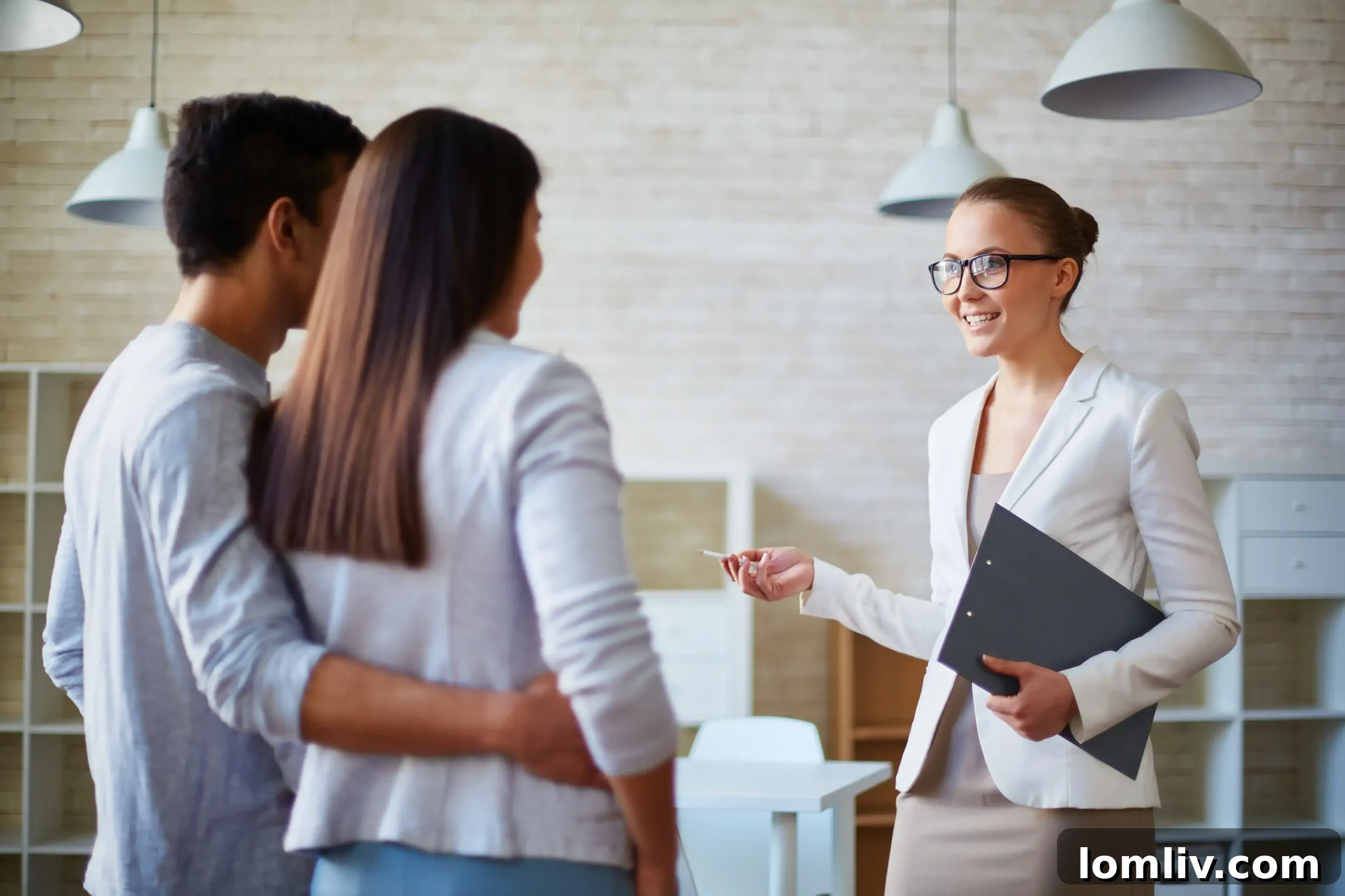 Beyond the Commission Why a Realtor is a Smart Investment 3 Real estate agent showing a house to a couple