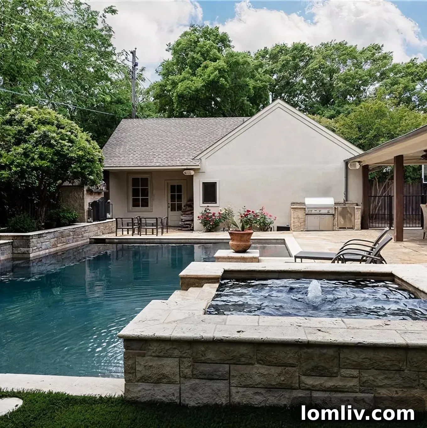 Tanning ledge of Scottie Scheffler's pool with elegant stone coping