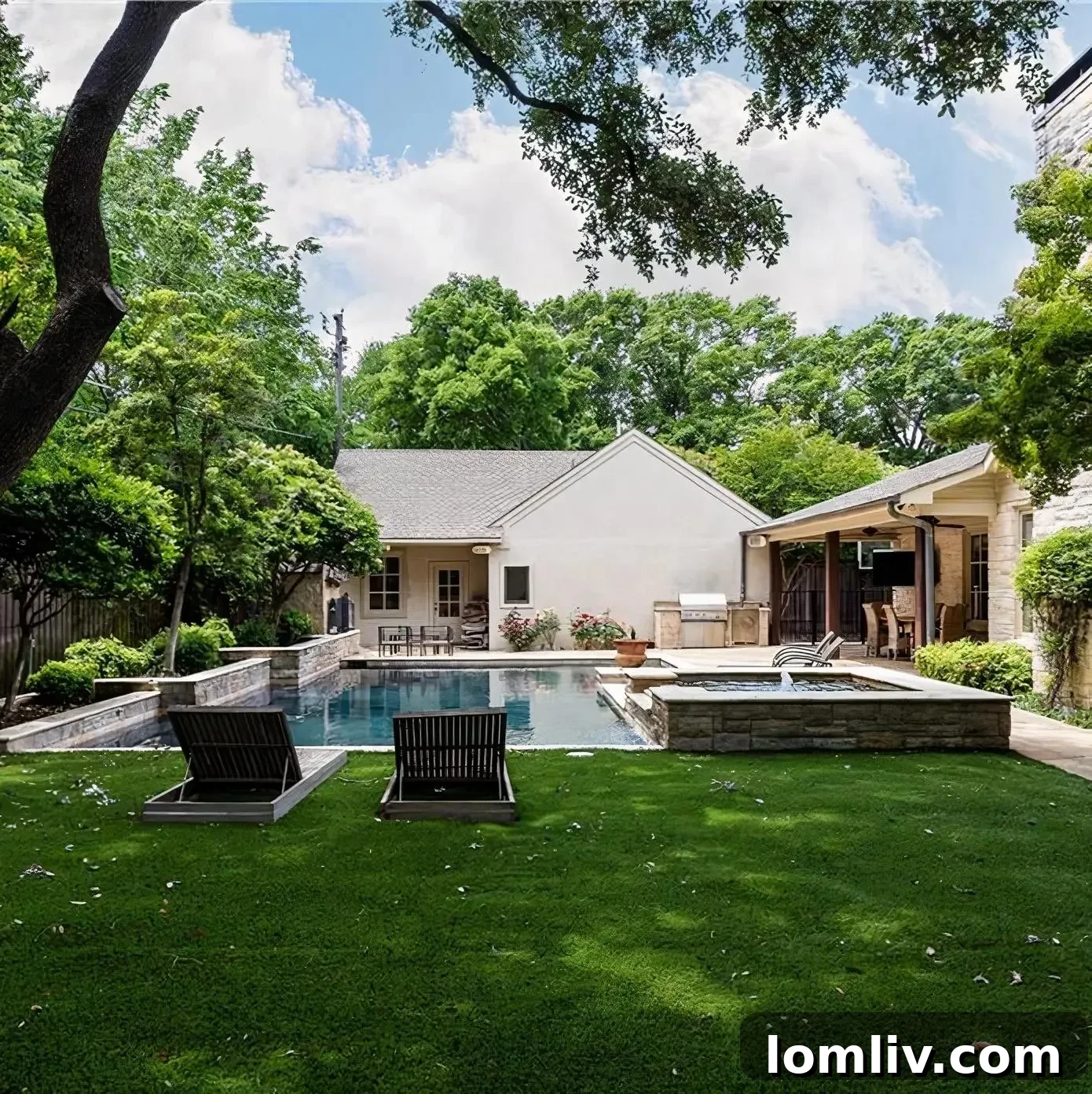 Overview of Scottie Scheffler's beautiful backyard with mature trees and privacy
