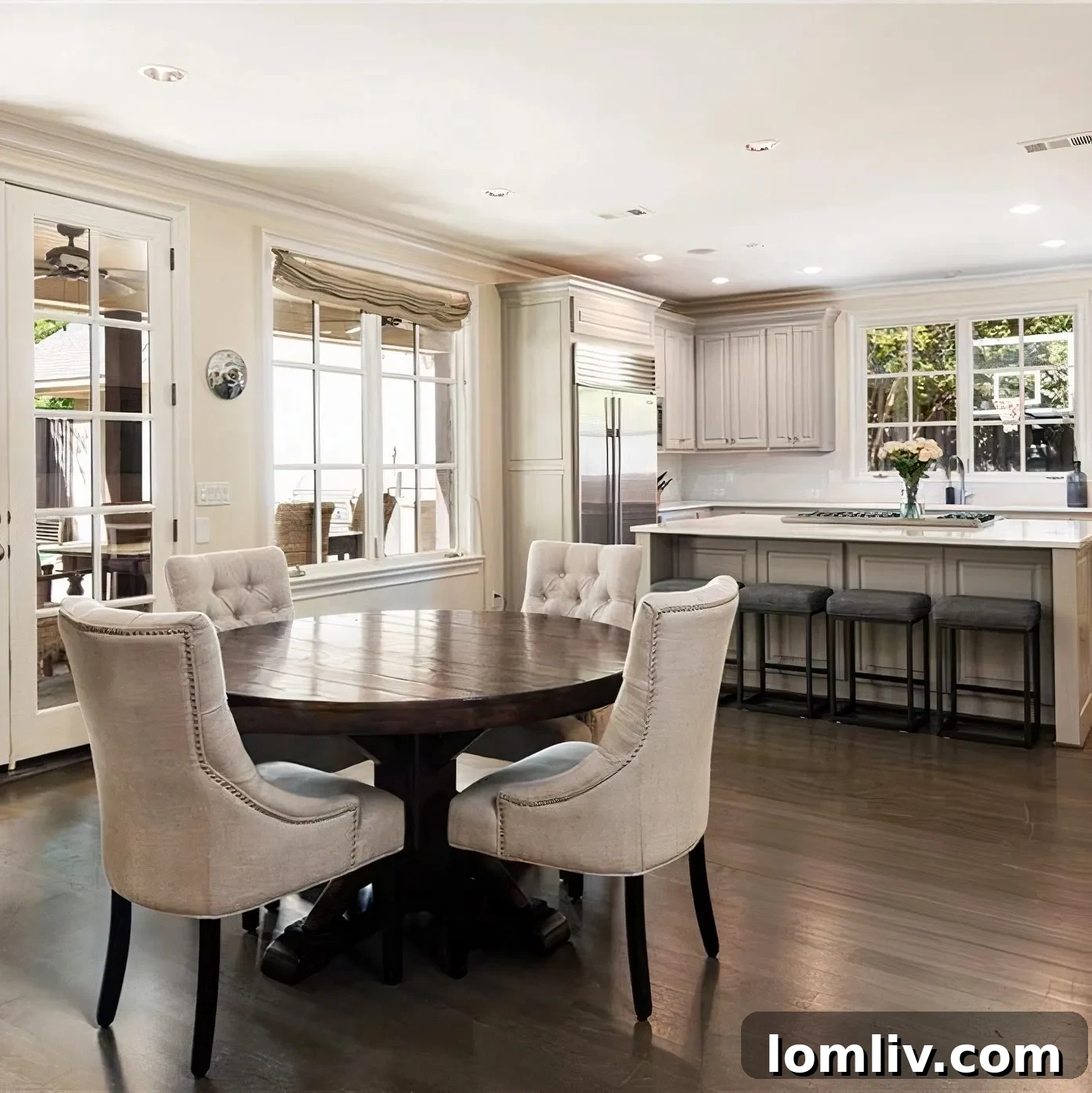 Scottie Scheffler's modern kitchen with shaker cabinets, stainless steel appliances, and a large island