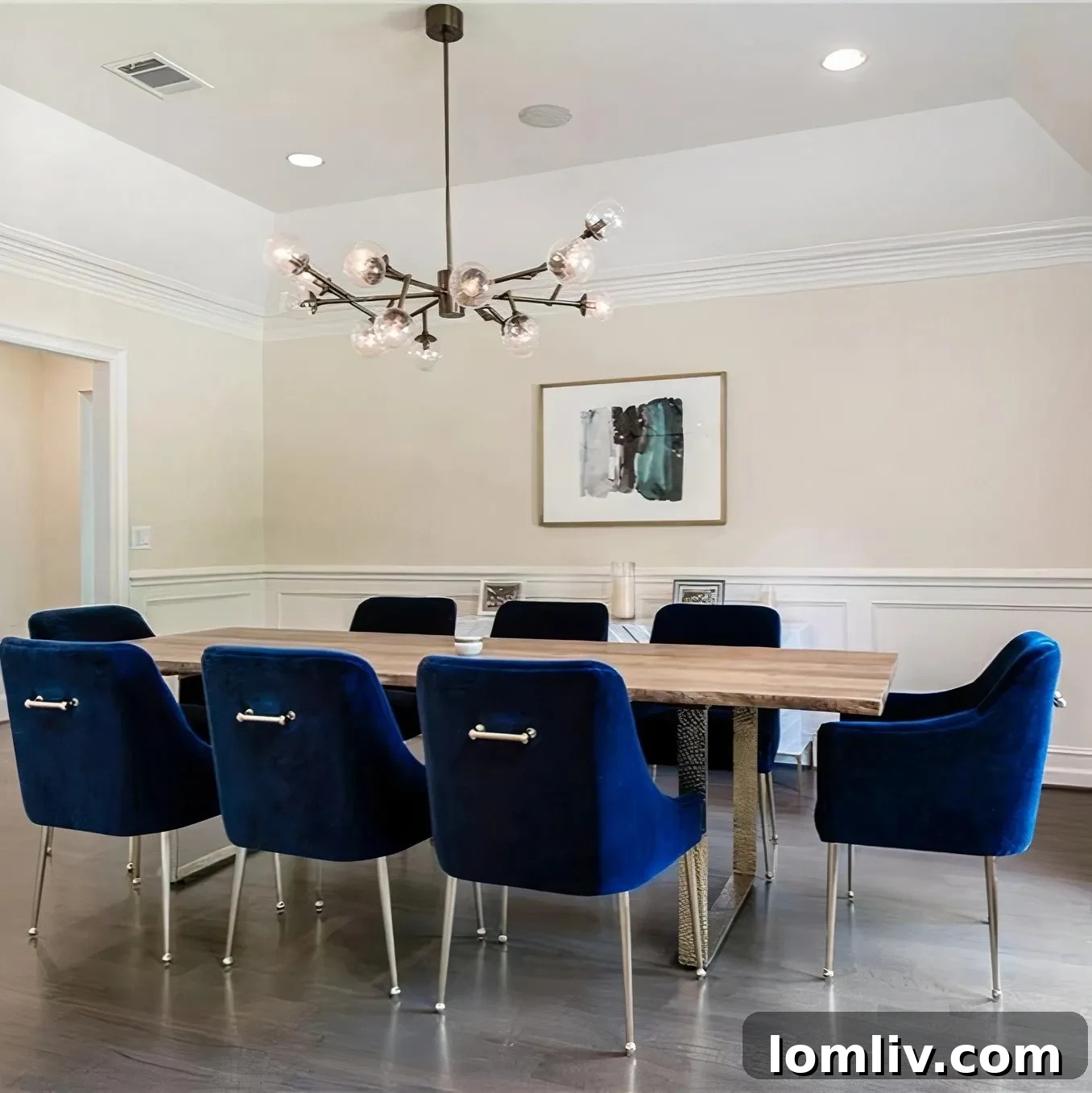 Scottie Scheffler's elegant dining room with a live-edge wooden table and dark blue velvet chairs