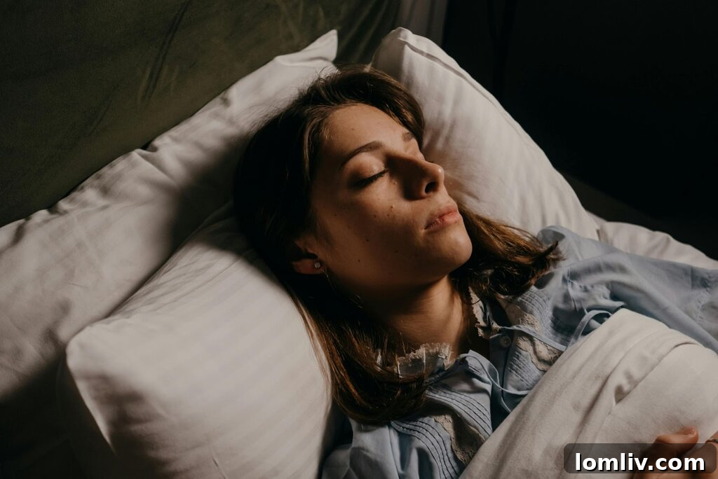 Decoding Early Pregnancy Night Sweats Causes and Effective Solutions 2 Pregnant woman sleeping restlessly due to night sweats